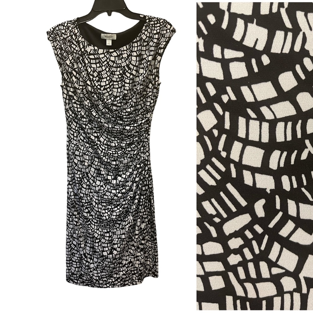 Black and white faux wrap dress with ruching.